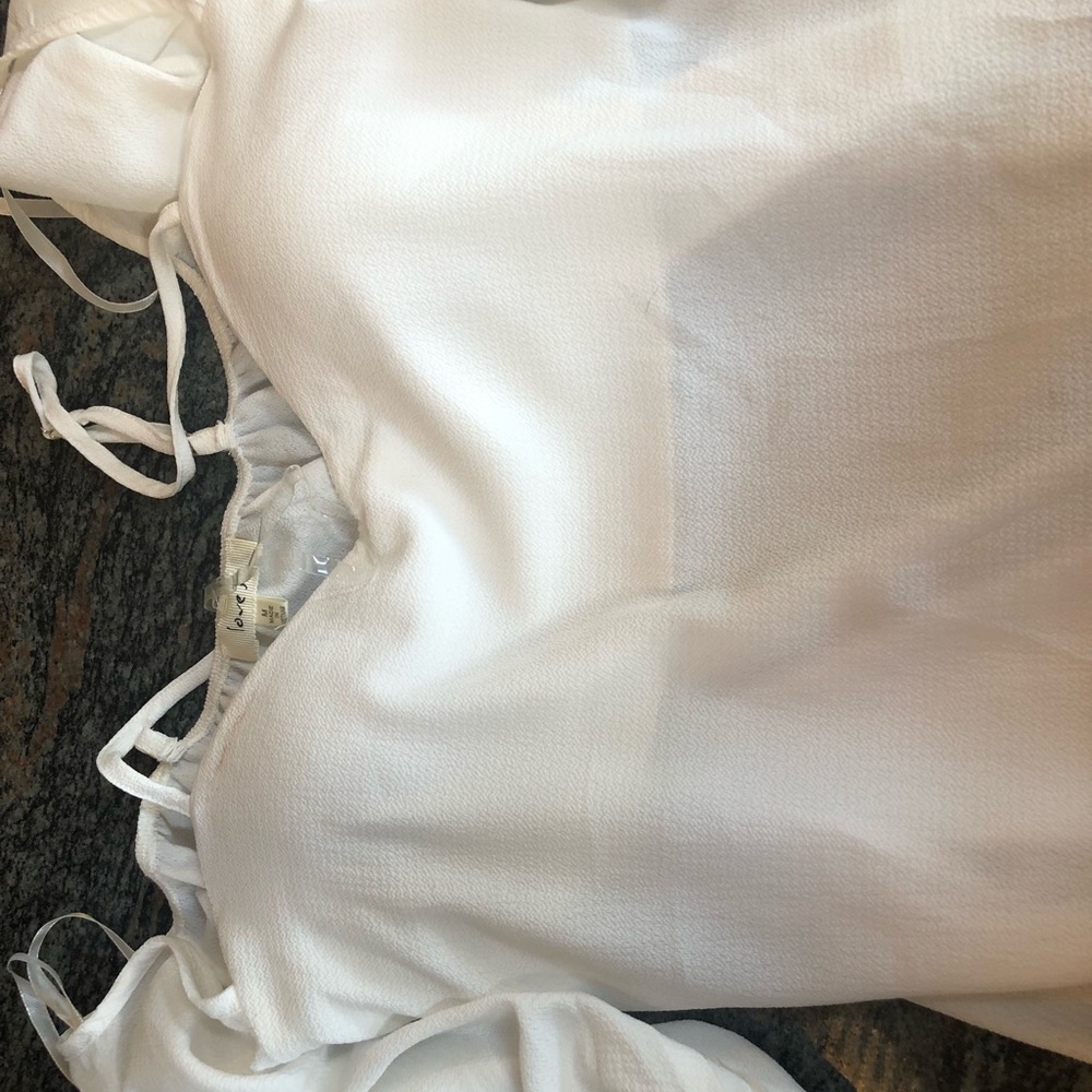 White off shoulder sleeves that just sit on arm